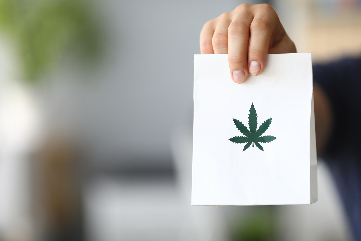  Courier hand passing package with marijuana Courier hand passing package with marijuana