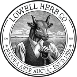 Logo for Lowell Herb Co featuring a humanoid figure with a bull's head, wearing a vest and holding a shovel, standing in front of a field. Latin motto and company details circle the image. Lowel-Logopng
