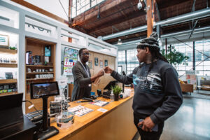 Satisfied Customer making a purchase at the Harborside storefront BC6A9427