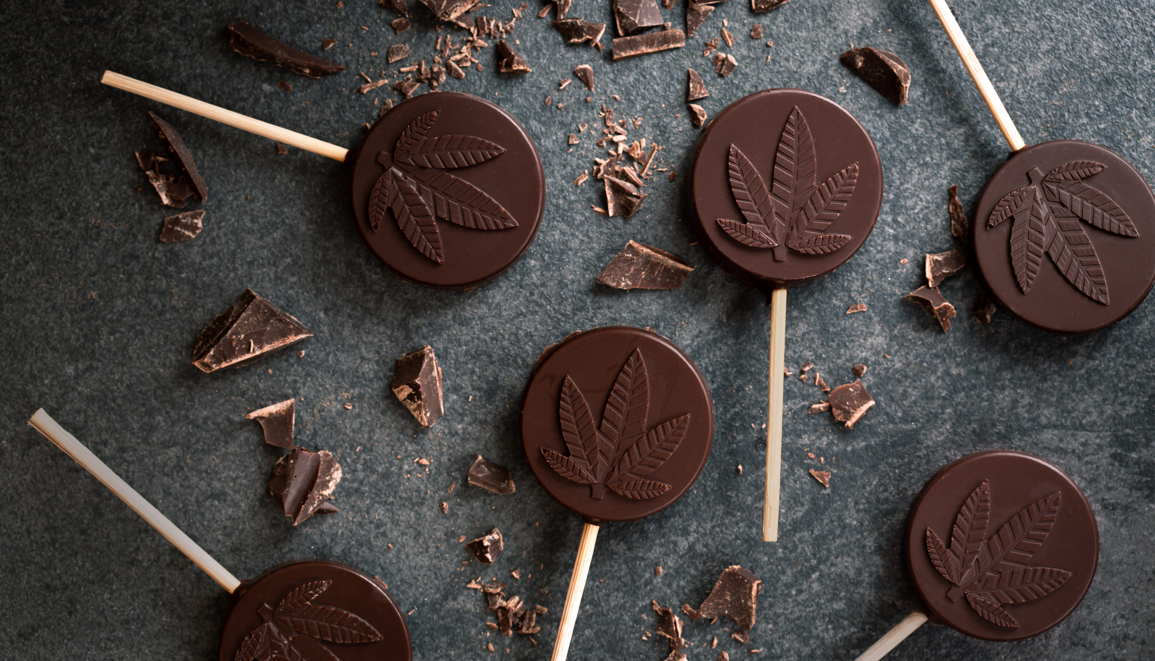 Cannabis Lollipop edibles on display at Harborside. cannabis infused chocolate lollipops - 10mg THC 0mg CBD